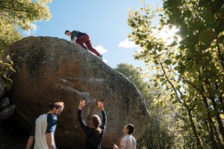 Go rock climbing at Buttes-Chaumont Park's climbing wall.